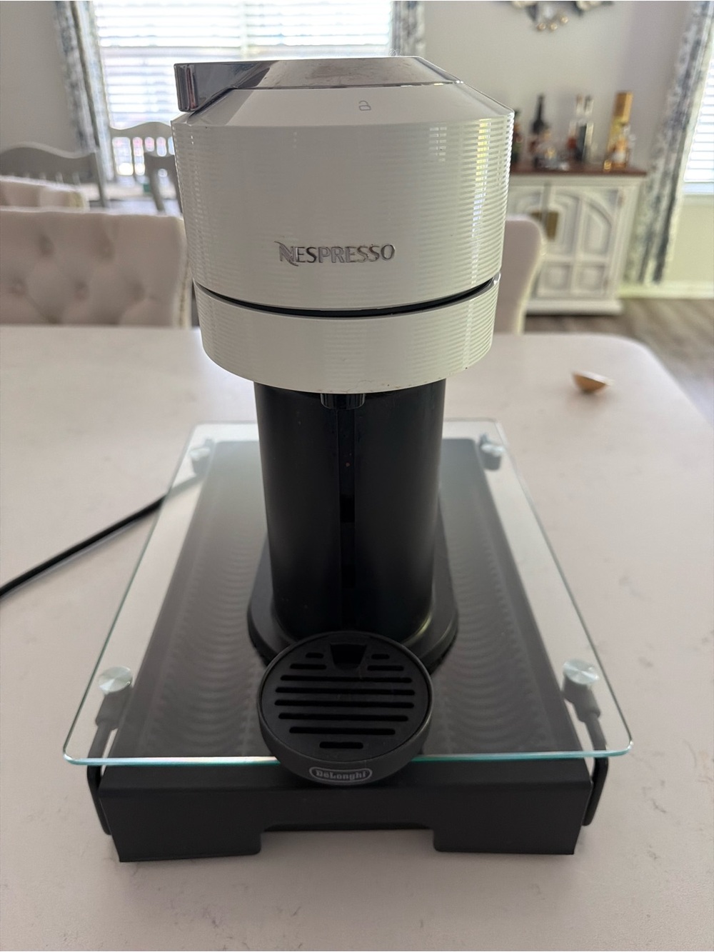 Nespresso Capsule Espresso Machine in White and Black & pod holder